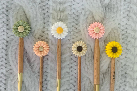 Daisy Knitting needle toppers and point protectors. A cute way to stop your stiches slipping. A perfect gift for knitters