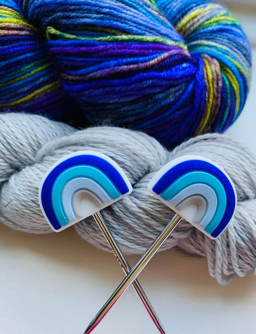 Rainbow Knitting needle toppers and point protectors.