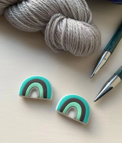 Rainbow Knitting needle toppers and point protectors.