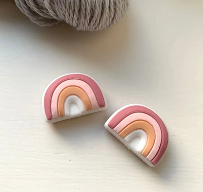 Rainbow Knitting needle toppers and point protectors.