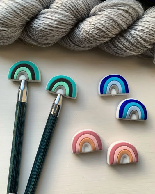 Rainbow Knitting needle toppers and point protectors.
