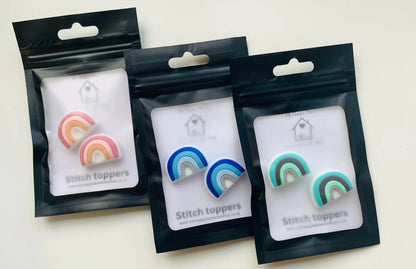 Rainbow Knitting needle toppers and point protectors.